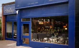 The blue storefront of Starling Bistro in Esher, Surrey